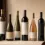 Deretan botol wine dengan berbagai bentuk di atas permukaan cream sebagai ilustrasi kisaran harga wine di Indonesia